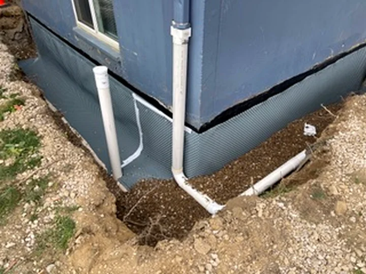 Pump & Gutter Discharge Lines project photo by Sferra Waterproofing
